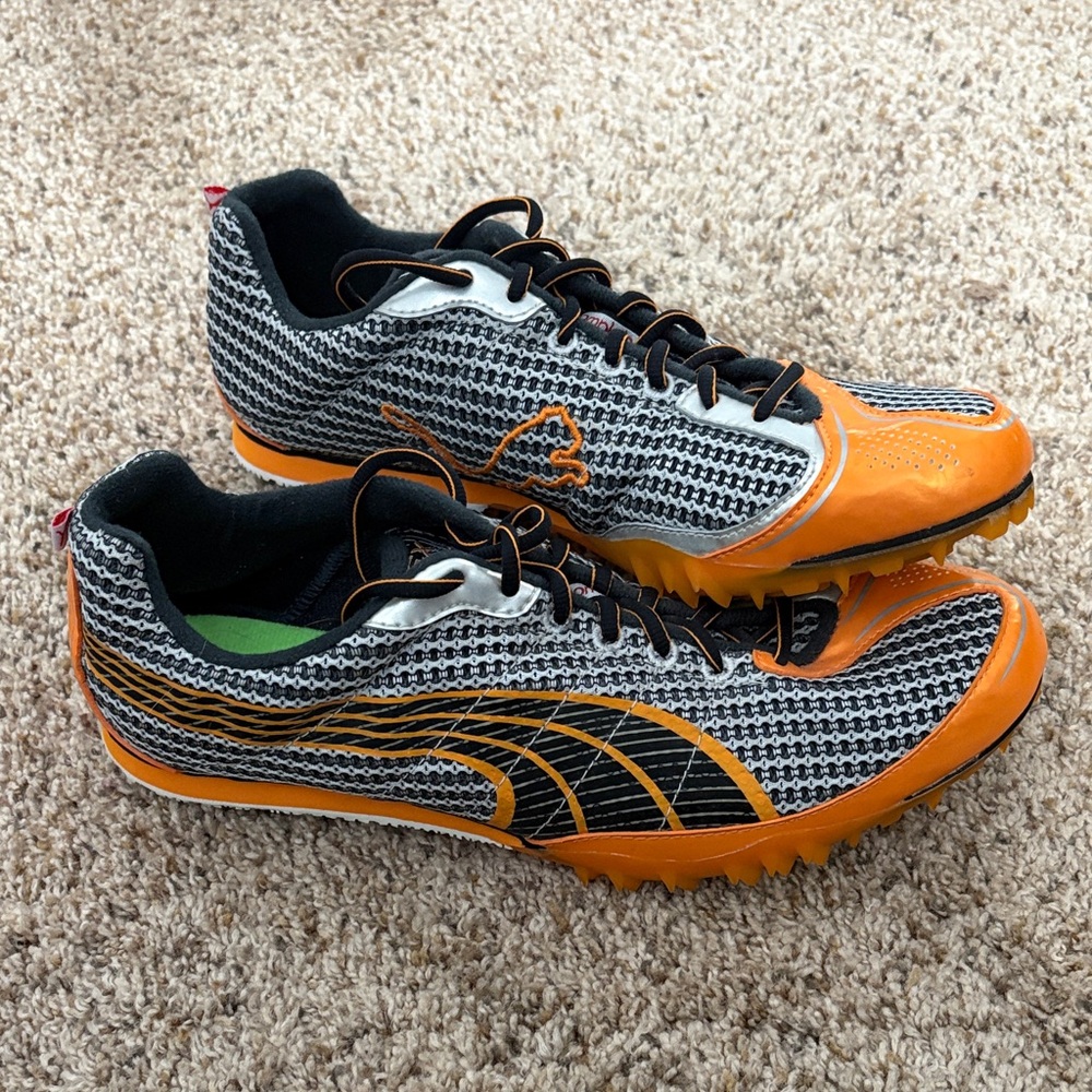 Puma Complete Black and Orange TFX lo spikes women’s 8.5